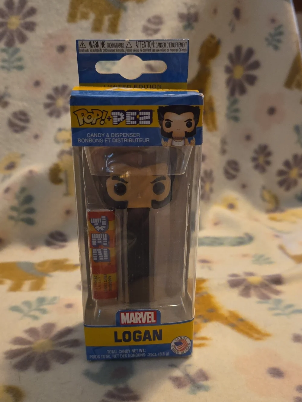 Marvel Logan PEZ Dispenser with Yellow & Blue Box Accents